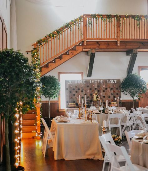 We love this beautiful staircase at the C Bar Ranch in Alachua, Florida! It's great for photos, the color of the wood is gorgeous and it's another place to put a decorative touch!  Florist: Pranges Rentals: Party Time Rentals Photographer: Ashley C Jackson Planner: A`vie Events  #floridawedding #weddingdecor #rustic #farmhouse #farmhousestyle #countryliving #weddings #weddingideas #weddinginspiration #bridal #bride #wedding #weddingblog #staircase #weddingvenue #candles #donuts #weddingday C Bar Ranch, Alachua Florida, Ranch Wedding Reception, Wedding Reception Diy, Blue Barn, Diy Wedding Reception, Reception Ideas, Ranch Wedding, Florida Wedding