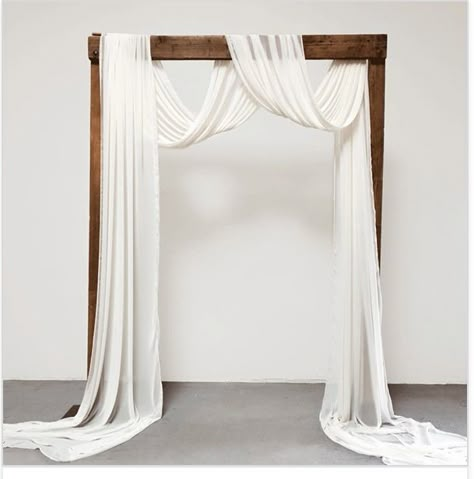 Minimal Wedding Arch Decor, Cloth Arch Wedding, Wedding Arbour With Fabric, Wooden Wedding Arch With Drape, Wedding Arch Cloth Draping, Cheesecloth Draping Wedding, Fabric Arch Wedding, Ceremony Arch Draping, Ceremony Arch With Draping