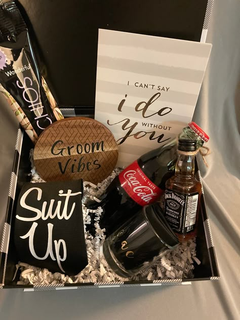 "The Groomsmen Box _ Suit up and Save the Date, Will you be my Groomsman for the Day? This Box has everything you need to ask your Crew individually to be apart of your Big day. Everything you need is in this Box  Box Includes:  \"I can't say I do without you\" card            Groom Vibes Wooden coaster     Coca Cola bottle   Personalized shot glass   \"Suit Up\" Tie  1.25 oz. pistachio  *libation is not included" Junior Groomsman Gift, Asking Groomsmen, Groom Gift Box, Groom Box, Groomsmen Boxes, Groomsman Proposal Box, Bridesmaid Proposal Diy, Groomsmen Proposal Gifts, Bridesmaid Groomsmen Gifts