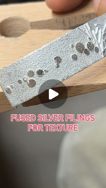 Robert Lopez on Instagram: "Texture Time!!!  Quick demo of fused silver filings on a sheet of Argentium Silver Sheet. This will be the base for a cuff I’m working on.   Most people use saw filings that they catch and save but I don’t saw that much, soooooo I found this key duplicator that I use to make a fat pile of silver filings in minutes.   #metalsmith #silversmith #handmadejewelry #artisanjewelry #instajewelry #fusedsilver #argentium #silvercuff #contemporaryjewelry #metalsmithing #jewelry @pepetools_usa" Texturing Metal For Jewelry, Silver Soldering Tutorial, Silversmithing Jewelry Ideas, Silver Smithing Jewelry, August Jewelry, Silversmith Techniques, Silversmithing Tutorials, Soldering Tutorial, Metal Tutorial