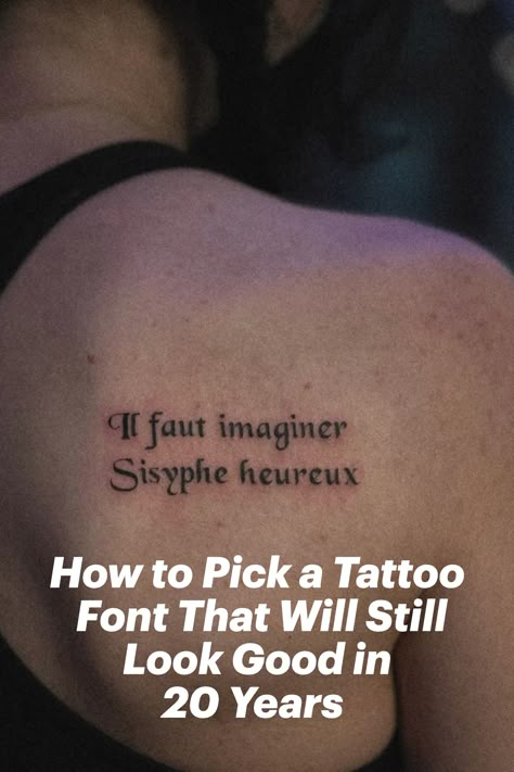 Gabby Pignanelli posing with her back to the camera showing off her tattoo that states, "If fault imaginer sysphe heureux." Where To Put Writing Tattoos, Tattoo Word Ideas Female, Text Based Tattoos, Font Ideas Tattoo, Tattoo Font Styles For Women, Unique Lettering Tattoo, Writing Styles For Tattoos, Best Font For Tattoo Lettering, Old Script Tattoo