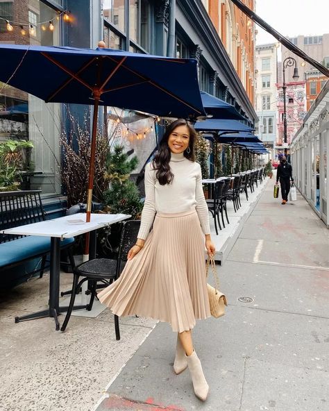 Ivory Midi Skirt Outfit, Ivory Pleated Skirt Outfit, Ivory Skirt Outfit, Pleated Midi Skirt Outfit Winter, Sweater And Pleated Skirt Outfit, Pleated Skirt With Sweater, Booties With Skirt, Cream Skirt Outfit, Prenup Shoot Ideas