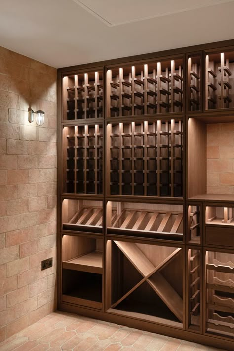 Sip, savor, and indulge in the ultimate wine experience with our bespoke joinery design in our clients wine cellar. A beautiful wine cellar tailored to our client’s vision, combines luxury and functionality in one seamless design. From rich wood textures to intricate details, this space is a true masterpiece thay will leave wine lovers in awe. Cottage Wine Cellar, Boros Pince, Small Wine Cellar Ideas, Stone Wine Cellar, Bar In Home, Rustic Wine Cellar, Small Wine Cellar, Unique Wine Cellar, Wine Cupboard