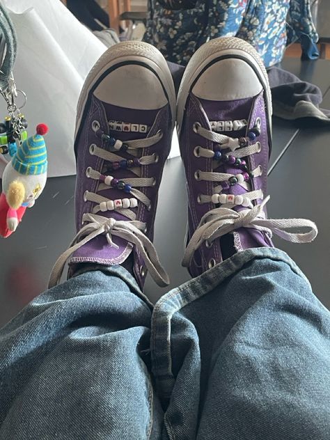 “Silly Clown” clown beads on purple converse!!! :) Beads On Converse, Purple Converse Aesthetic, Converse Beads, Dark Purple Converse, Stephanie Brown Aesthetic, Purple Converse Outfit, Beaded Converse, Lavender Converse, Customized Converse