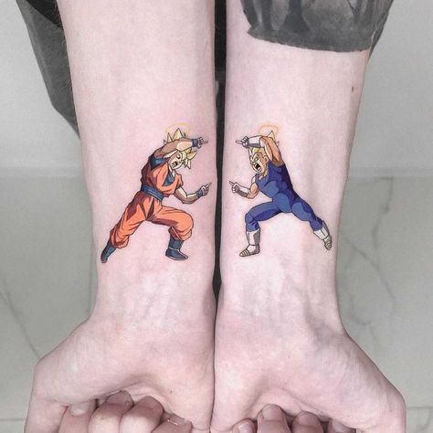 Dragon Ball Z Fusion tattoo by Eden Kozo inked on both wrists Reborn Tattoo, Fist Tattoo, Dbz Tattoo, Dance Tattoo, Brother Tattoos, Z Tattoo, Dragon Ball Tattoo, Omerta Tattoo, Red Tattoos