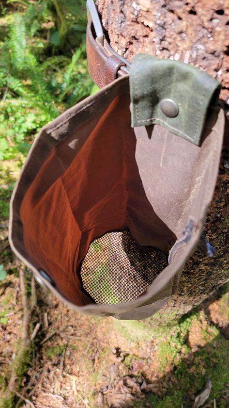 Have you been looking for the perfect mushroom foraging bag? Are you looking for something small and convenient to have? We have the perfect answer with our waxed canvas mushroom foraging pouch. This awesome bag snaps onto your belt so it's easy to take on and off. It has a slim profile so you don't even notice you are wearing it until you need it. When you find that perfect patch of mushroom just unsnap the front and roll out your awesome foraging bag with a mesh bottom. This bag is 12" deep wi Diy Foraging Bag, Foraging Pouch Diy, Forage Bag Pattern, Foraging Bag, Foraging Pouch, Foraging Bag Pattern, Crochet Foraging Bag Pattern, Mushroom Bag, Mushroom Foraging Bag