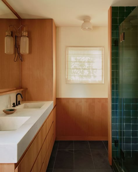 a bathroom with a couple of sinks Modern California Bathroom, Commune Design Bathroom, Mid Century Modern Powder Room, Bathroom Sink Wood, Bathroom Wood Wall, Japandi Style Bathroom, California Bathroom, Earth Tone Bathroom, Wood Panel Bathroom