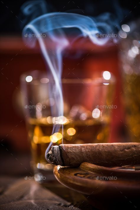 Cuban cigar smoke and luxurious Cognac in carafe by merc67 on PhotoDune. Cuban cigar smoke and luxurious Cognac in carafe. Orishas Yoruba, Cigars And Women, Whiskey Gifts, Cuban Cigars, Cigars And Whiskey, Jack Daniels, Natural Food, Cigars, Bourbon