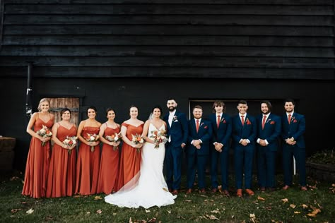 Navy Blue And Rust Bridesmaid Dresses, Navy Blue And Terracotta Wedding Party, Terracotta Wedding With Navy, Blue And Cinnamon Wedding, Rust And Navy Wedding Party, Navy Blue And Terracotta Groomsmen, Navy Blue Suit With Burnt Orange Tie, Navy Blue And Cinnamon Wedding, Terra Cotta And Navy Wedding