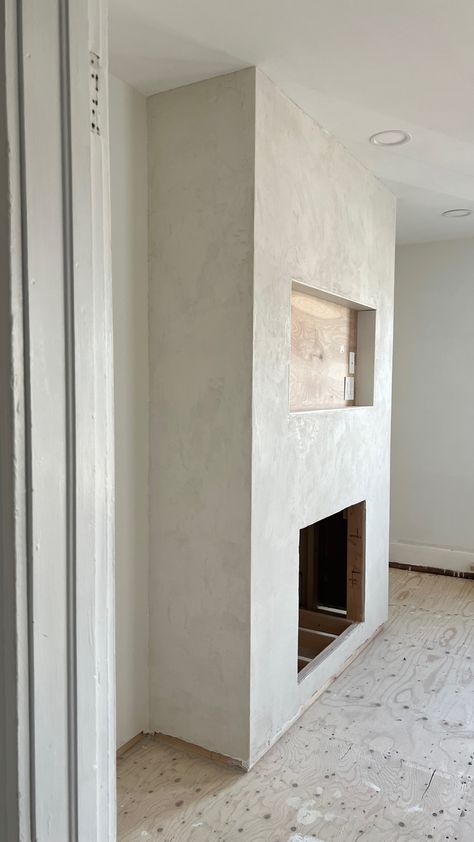 Introducing a Cozy Fireplace Accent Wall with Firmolux – KP HOME RENO Closed Built Ins Around Fireplace, Clean Fireplace Design, Rendered Fireplace Wall, Texture Fireplace Wall, White Textured Fireplace, Wall Space Around Fireplace, Plaster Paint Fireplace, Ardex Feather Finish Fireplace, Full Tile Fireplace