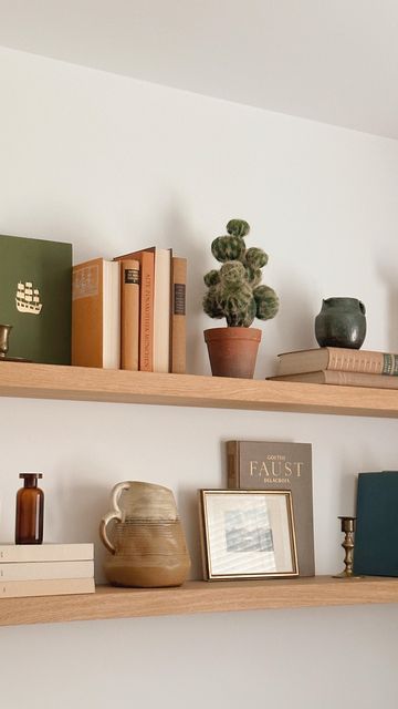 Books Floating Shelves, Styled Floating Shelves, Floating Shelves Bedroom Books, Thrifted Shelf Decor, Long Shelf Above Couch, Shelf Above Couch, Floating Shelves Above Couch, Uni Room Ideas Uk, Shelves Above Desk