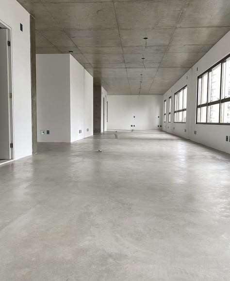 Concrete Floors Salon, Exposed Concrete Floor, Concrete Floors Office, Concrete Floor Office, Office Concrete Floor, Concrete Office Interior, Mix Used Building, Exposed Concrete Ceiling, Interior Design Basement