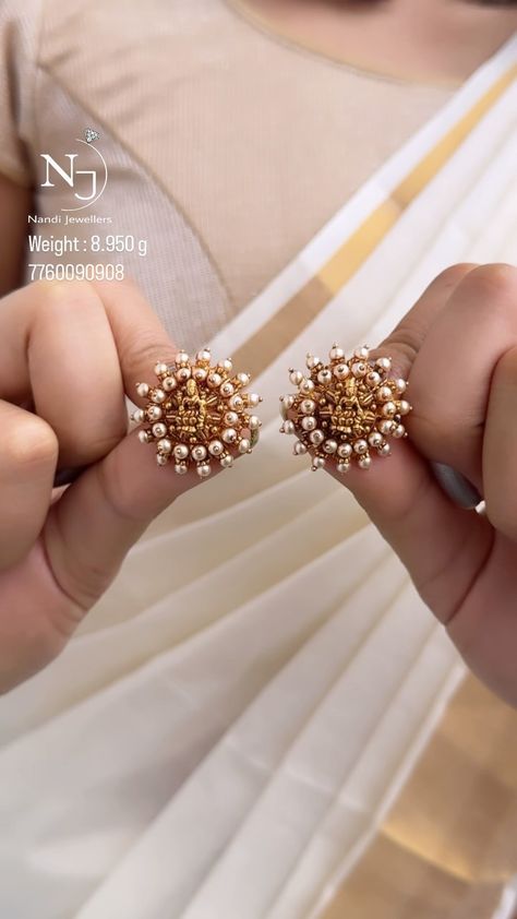 Lakshmi Pearl Ear Studs From 'Nandi Jewels' • South India Jewels Ear Studs Indian, Big Earrings Gold, Latest Earrings Design, Small Earrings Gold, Pearl Earrings Designs, Gold Pearl Jewelry, New Gold Jewellery Designs, Gold Earrings Models, Diamond Pendants Designs