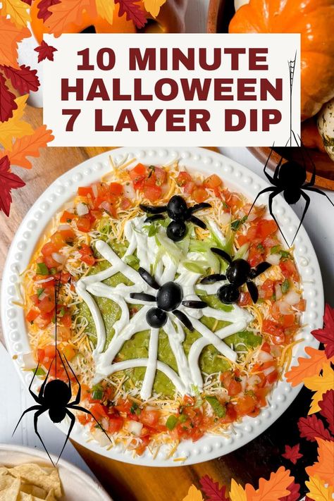 This Halloween 7 Layer Dip is a fun, delicious, and even spooky treat for kids and adults alike. A classic and easy party appetizer that's ready in 10 minutes, and can even be made ahead. Easy to make? Absolutely, including the edible spiders and their web! Halloween Food Dip, Easy Halloween Taco Dip, Halloween Appetizer Dips, 7 Layer Taco Dip Halloween, Spooky Halloween 7 Layer Dip, Halloween Food For Party Appetizers Dip Recipes, Halloween 7 Layer Taco Dip, Halloween Mexican Dip, Spooky Seven Layer Dip