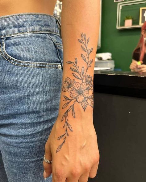 Minimalistic forearm floral tattoo Tattoos Between Breast, Arm Tattoos For Women Forearm, Arm Wrap Tattoo, Wrap Around Wrist Tattoos, Floral Arm Tattoo, Simple Forearm Tattoos, Around Arm Tattoo, Wrap Around Tattoo, Arm Sleeve Tattoos For Women