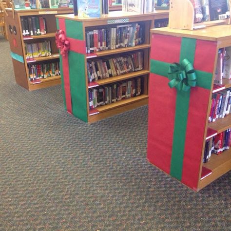 Christmas Decor Ideas In Library, Library Book Return Ideas, School Library Decorations, Christmas Library Display, Christmas Library, School Library Bulletin Boards, Library Christmas, Library Decorations, School Library Decor