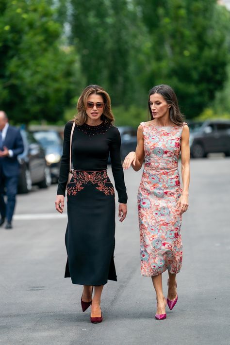 Queen Letizia wore Diego Estrada Printed Silk Jacquard Dress, Gold & Roses Luzia 2 Stars Earrings, Corterno Ring, Carolina Herrera Slingback Pumps to welcome Queen Rania in Madrid

Queen Rania wore Christian Dior Butterfly top and skirt, Fendi bag, Manolo Blahnik pumps and Saint Laurent Sunglasses to meet Queen Letizia Butterfly Top And Skirt, Prince Hashem, Dior Butterfly, Jennifer Lawrence Style, Queen Rania Of Jordan, Rania Of Jordan, Stars Earrings, Manolo Blahnik Pumps, King Abdullah