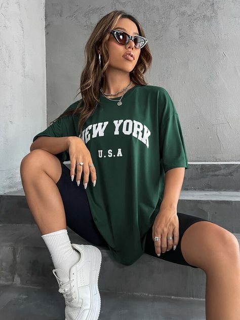 Letter Graphic Drop Shoulder Tee | SHEIN USA Down Shoulder Tshirt Women, Green Tee Shirt Outfit, Oversize Tops For Women, Summer Shorts And Tee Outfit, Cute Baggy Summer Outfits, Long Tshirt Outfits Summer, Green T Shirt Outfit Women, Dark Green Graphic Tee, Short And Tshirt Outfits