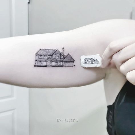 House Tattoos: The Latest Craze Explained | realtor.com® House Tattoos, Baker Tattoo, Family Disappointment, Tree Tattoo Ideas, Lake Tattoo, House Outline, 2023 Tattoo, House Tattoo, Vintage Cowgirl Art