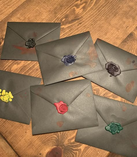 Black envelopes, red paint for “blood”, melted crayons for seals Clue Themed Party Invitations, Clue Bday Party, Clue Party Themes, Traitors Themed Party, Mystery Theme Party Decoration, Clue Hoco Theme, Clue Board Game Party Decorations, Clue Mystery Party, Clue Themed Birthday Party Decorations