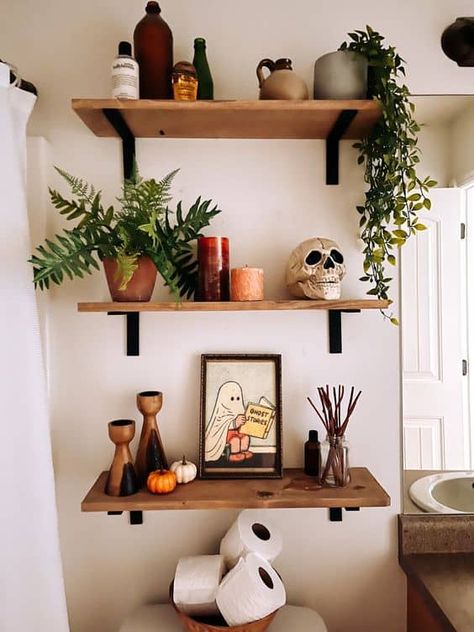 26 Stunning Halloween Shelf Decor Ideas » Lady Decluttered Fall Shelf Decor, Fall Apartment Decor, Halloween Bathroom Decor, Fall Bathroom Decor, Fall Bathroom, Halloween Bathroom, Bathroom Shelf Decor, Diy Halloween Decor, Halloween Tattoo