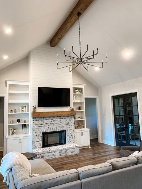 Modern Farmhouse Fireplace Ideas, Cheap Couches, Ceiling Beams Living Room, Farmhouse Fireplace Ideas, Modern Farmhouse Fireplace, Beams Living Room, Vaulted Ceiling Living Room, Brick Fireplace Makeover, Fireplace Built Ins