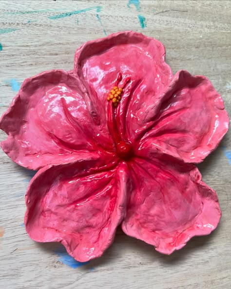 Baby booties & clay hibiscus flower I made!! 🌺❤️🖌️ Hibiscus Air Dry Clay, Hibiscus Flower Jewelry Holder, Hibiscus Jewelry Holder, Hibiscus Flower Clay Tray, Flowers Out Of Clay, Hibiscus Clay Tray, Clay Hibiscus Flower, Clay Ideas Flower, Clay Crafts Flower