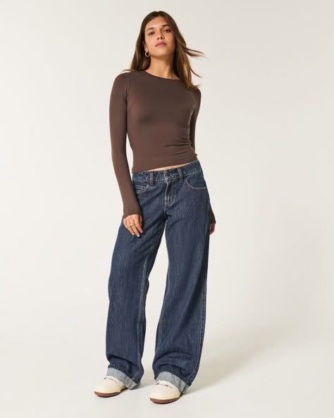 Women's Low-Rise Dark Wash Baggy Jeans | Women's Bottoms | HollisterCo.com Dark Washed Jeans Outfit, Dark Wash Baggy Jeans, Light Wash Jeans Outfit, Dark Jeans Outfit, European Closet, Wash Jeans Outfit, Girl Streetwear, Low Rise Baggy Jeans, Simple Outfits For School