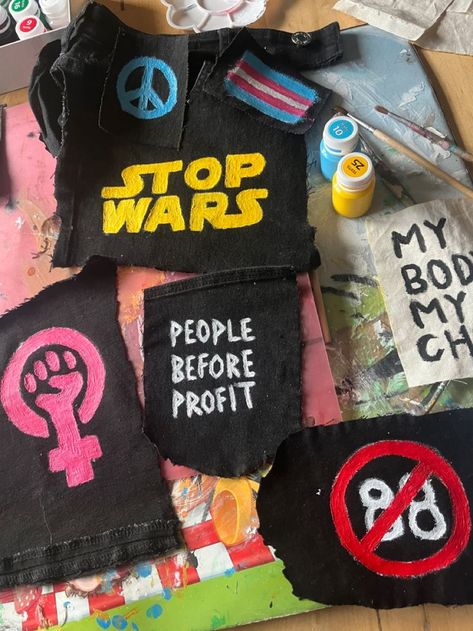 Alt Pins And Patches, Patch Overalls Punk, Diy Punk Jacket Ideas, Trans Punk Patches, Patch Making Diy, Patch Pants Punk Ideas, Diy Patch Ideas Punk, Punk Pins Ideas, Battle Jacket Patch Ideas