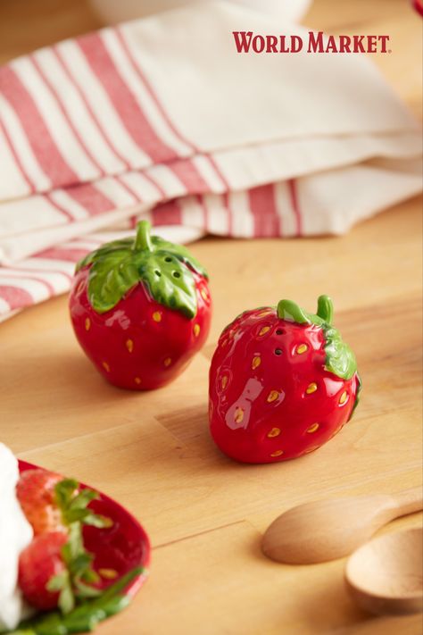 Bring sweet, garden-inspired character to your daily dining with our exclusive strawberry-shaped salt & pepper shakers. Made of stoneware and hand-painted in bright red with green stems, these gift-worthy seasoning shakers add whimsy and charm to the table. #WorldMarket #StrawberryCollection #Strawberries #KitchenDecor Painted Strawberry, Strawberry Shortcake Party, Strawberry Decorations, Clay Diy Projects, Salt And Pepper Set, Unique Kitchen, Popular Tattoos, Garden Inspired, World Market