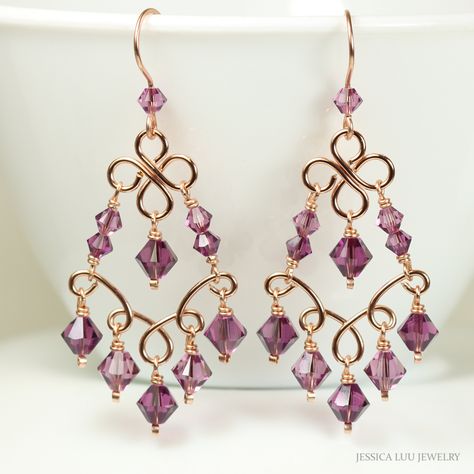 Rose Gold Amethyst Purple Chandelier Earrings Handmade by Jessica Luu Jewelry ~ Glamorous ~ Elegant ~ Feminine ~ 2 shades of purple crystals pair beautifully with rose gold in these luxurious chandelier earrings  MATCHING ITEMS https://www.etsy.com/shop/JessicaLuuJewelry?search_query=amethyst MATERIALS: ~ 6mm amethyst and iris crystals from Austria ~ Hand formed 14K rose gold filled wire frames ~ Hand made 14K rose gold filled French hook ear wires DIMENSIONS: ~ Just over 2.25 inches long ~ 1 in