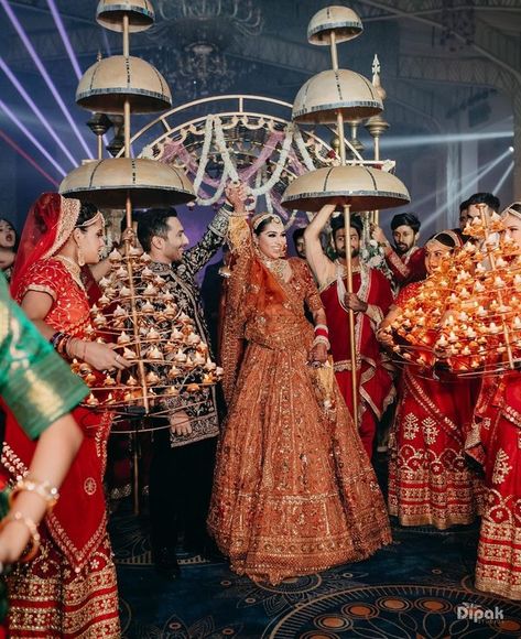 Skip the pastels & Try Fuschia Pink, Burnt Orange & Other Unique Colours For Bridal Lehengas | WeddingBazaar Orange Indian Wedding Dress, Pria Beniwal, Milind Gaba, Millind Gaba, Orange Lehenga, Burnt Orange Weddings, Delhi Wedding, Indian Bridal Lehenga