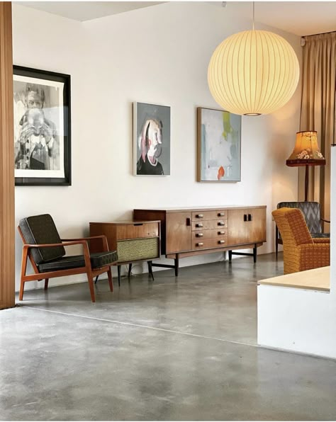 Concrete Floor Decor Interior Design, Scandinavian Interior Concrete Floors, Mid Century Modern Cement Floor, Mcm Concrete Floors, Living Room Cement Floor, Mid Century Modern Living Room Concrete Floor, Cement Floor Apartment, Cement Living Room Floor, Mid Century Concrete Floor