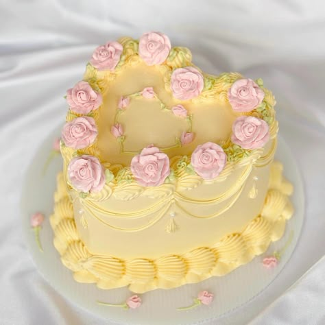 🧈buttery pastel yellow and soft pink roses… | Instagram Fluttershy Aesthetic, Yellow Birthday Parties, Heart Birthday Cake, Yellow Wedding Cake, Soft Pink Roses, 14th Birthday Cakes, White Birthday Cakes, Vintage Birthday Cakes, Pastel Birthday