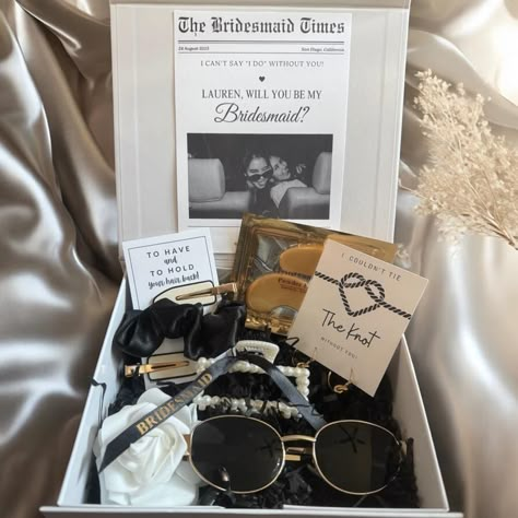 We have spent so much curating the perfect ultimate newspaper-inspired bridesmaid proposal box - a charming and nostalgic way to ask your closest friends to stand by your side on your special day! This unique box is designed to look like a vintage newspaper, complete with personalized headlines and articles that capture the essence of your friendship and the upcoming wedding. Inside, your bridesmaids will find delightful keepsakes. Every detail, from the old-fashioned fonts adds a touch of elega