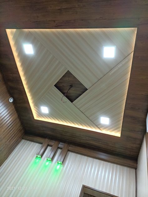 This is a false ceiling design made with PVC panels.This design is suitable for office, drawing room, bedroom,or any type of 10×10 Room. Fase Ceiling Design For Bedroom, Pvc Panel Ceiling Design Office, False Ceiling Design 10*10, P O P Ceiling Designs For Bedroom Simple, Drawing Room Pvc Wall Designs, Pvc Ceiling Design Drawing Room, Pcv Panel Ceiling, Pop Drawing Room Design, Drawing Room Pvc Designs