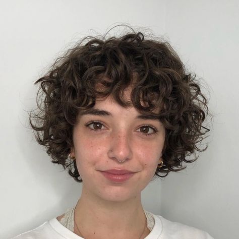 Stacked Haircuts For Curly Hair, Short Really Curly Hair, Curly Micro Bob, Curly Micro Bangs, Nonbinary Hair Curly, Nonbinary Hairstyles, Curly Bowl Cut, Short Curly Shag Haircut, Short Curly Shag With Bangs