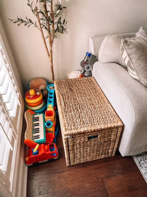 Toy Bin In Living Room, Toy Storage In Bedroom Small Spaces, Toy Area In Bedroom, Living Room Toys Storage Ideas, Organization For Toys In Living Room, Boho Toy Chest, Toy Storage For Nursery, Toy Storage Baskets Living Rooms, Stylish Kids Toy Storage