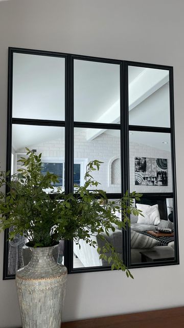 Big Mirror Living Room Wall, Mirror Wall Above Couch, Mirror Wall Behind Couch, How To Make A Mirror Look Like A Window, Target Wall Mirror Hack, Nissedal Mirror Ikea Hack, Mirror On Top Of Couch, Faux Window Mirror, Stair Mirror Wall