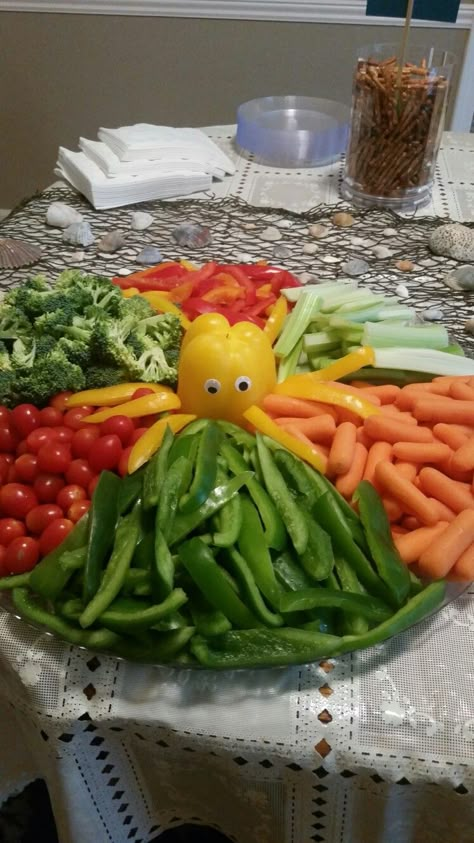 Veggie tray with an octopus in the middle made out of two yellow peppers and self stick googly eyes Baby Shower Ideas For Boys Themes, Vegetable Trays, Ocean Birthday Party, Shark Themed Birthday Party, Fishing Birthday Party, Vegetable Tray, Baby Shower Ideas For Boys, Boho Ideas, Shark Birthday Party