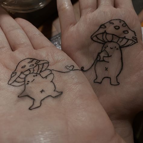 tiny mushroom matching matching tattoo cute mushroom mushroomdrawing Bestie Mushroom Tattoo, Matching Mushrooms Tattoo, Matching Cottagecore Tattoos, Mushroom Best Friend Tattoo, Best Friend Mushroom Tattoo, Walking Mushroom Tattoo, Mushroom Man Tattoo, Mushroom People Tattoo, Mini Mushroom Tattoo