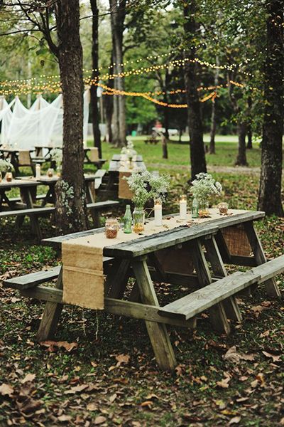 Getting married in a park? A simple runner over a picnic table elevates it to wedding-ready. Picnic Table Wedding, Wedding Picnic Reception, Wedding Reception On A Budget, Outdoor Picnic Table, Wedding Reception Layout, Reception Layout, Camping Wedding, Picnic Style, Picnic Wedding