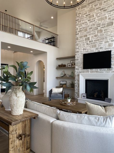 Fireplace Two Story Living Room, Two Story Great Room Fireplace, Two Storey Fireplace, High Ceiling Living Room Decor, 12 Foot Ceilings Living Room, Modern High Ceiling Living Room, High Ceiling Fireplace Wall, Fireplace Tall Ceilings, 2 Story Fireplace Ideas