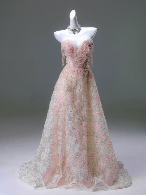 Celebrate your special day in our Light Pink Lace Floral Wedding Gown, a harmonious blend of tradition and elegance. This gown is exquisitely crafted with light pink floral lace, which overlays a serene beige foundation, offering a subtle yet stunning color contrast. Embellished with meticulously placed crystal beading 2 Tone Wedding Dress, Strange Wedding Dresses, Pink Floral Ball Gown, Light Pink Corset Dress, Majestic Dresses Gowns, Pink Contrast Color Combinations Dresses, Wedding Dresses Light Pink, Non Traditional Wedding Dress Colors, Pink Floral Wedding Dress