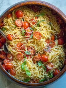 Ina Garten’s Summer Garden Pasta Ina Garten Pasta Salad, Summer Garden Pasta, Pasta With Tomatoes, Summer Pasta Dishes, Garden Pasta, Ina Garten Recipes, Summer Pasta Salad, 12 Tomatoes, Cabbage Recipes