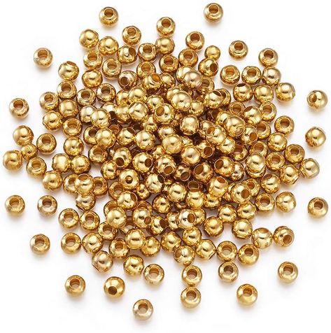 Craftdady 200Pcs Golden Tiny Round Ball Spacer Beads 5mm Metal Smooth Rondelle Charm Loose Beads for DIY Jewelry Craft Making with 2mm Hole Visit the Craftdady Store 3.6 out of 5 stars 269 ratings Price: $6.98 Letter Bead Bracelets, Golden Beads, Diy Jewelry Unique, Letter Bracelet, Craft Making, Beaded Pendant Necklace, Bead Kits, Letter Beads, Diy Crafts Jewelry