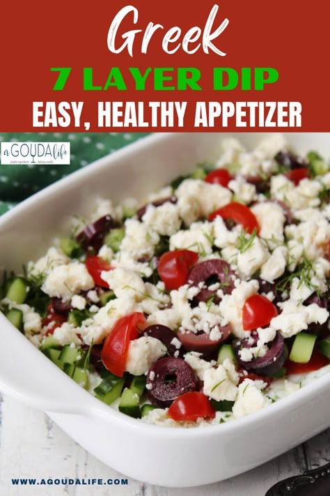 Light, HEALTHY - Greek 7-Layer Dip. Easy, make-ahead appetizer with hummus, tzatziki, tomatoes, cucumber, olives, feta and dill. Serve with pita or naan and watch it disappear! #greekdip #7layerdip #greek7layerdip #layeredgreekdip #greeklayereddip #hummus #tzatziki #healthyrecipes #healthyappetizer #easterrecipes #easterappetizer #greekrecipes #agoudalife Greek Dip With Hummus And Tzatziki, Hummus Tzatziki Dip, 7 Layer Greek Hummus Dip, Hummus Feta Cucumber Dip, Greek Dip Appetizer, 7 Layer Dip Easy, Greek 7 Layer Dip, Layered Greek Dip, Greek Dips