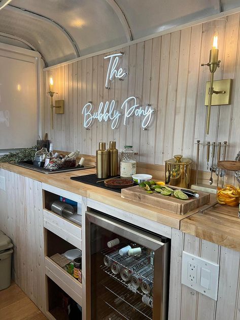 Bubbly Pony Traveling Luxury Bar Horse Trailer Bar Interior Ideas, Trailer Bar Interior, Horse Trailer Coffee Shop, Drink Trailer Ideas, Horse Trailer Bar Interior, Horse Trailer Interior Remodel, Beverage Trailer, Traveling Luxury, Float Bar