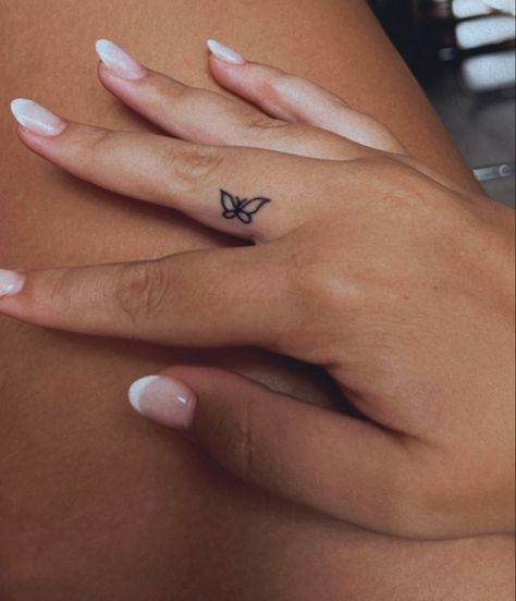 Tiny Butterfly Finger Tattoo, Inside The Finger Tattoo, Inside Of Finger Tattoo, Tattoo Between Fingers, Middle Finger Tattoo For Women, Finger Tattoos Inside, Finger Butterfly Tattoo, Inside Finger Tattoo, Butterfly Tattoo Finger