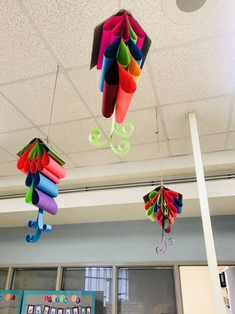 Mrs. J in the Library's note: Decorations idea for secondary or elementary school libraries - "books" sprouting colored paper.  Looks easy enough to make with a stapler and bright printer paper, actually. Amazing Library, School Library Decor, Library Decorations, School Library Displays, School Library Ideas, Library Display Ideas, Library Themes, Library Book Displays, Elementary School Library